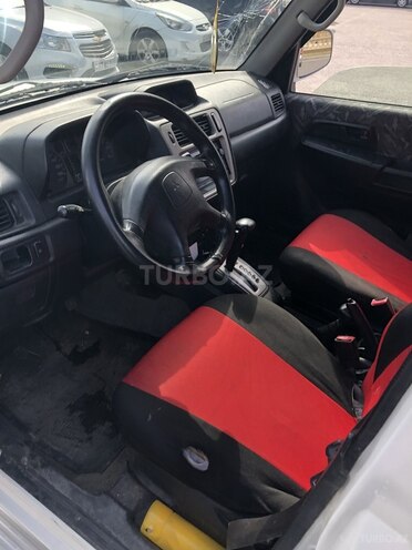Mitsubishi Pajero io 1999, 400,000 km - 1.8 l - Bakı