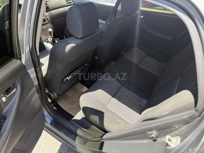 Toyota Corolla 2006, 244,000 km - 1.4 l - Bakı