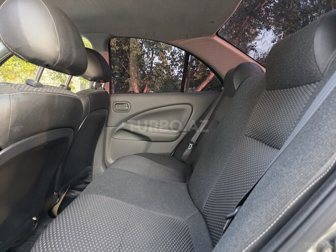 Nissan Sunny 2008, 412,321 km - 1.6 l - Quba