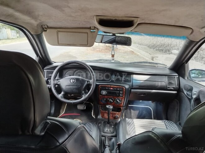 Opel Vectra 1997, 214,559 km - 1.8 л - Quba
