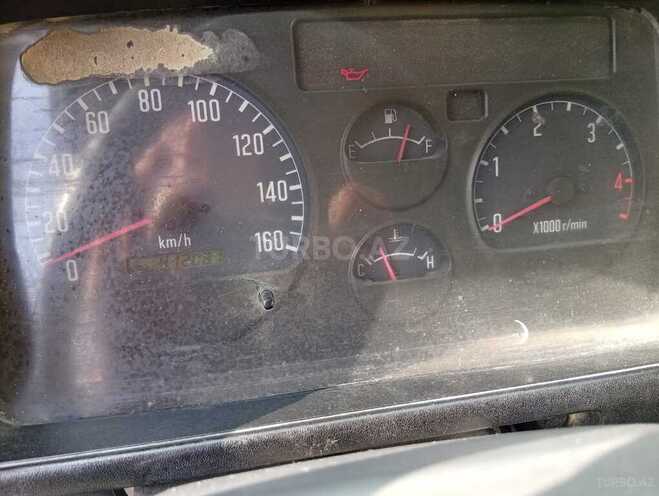 Isuzu NKR 55 E 2009, 412,081 km - 2.7 l - Bakı