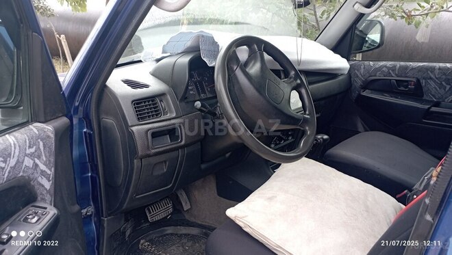 Mitsubishi Pajero io 1999, 180,000 km - 1.8 л - Xırdalan