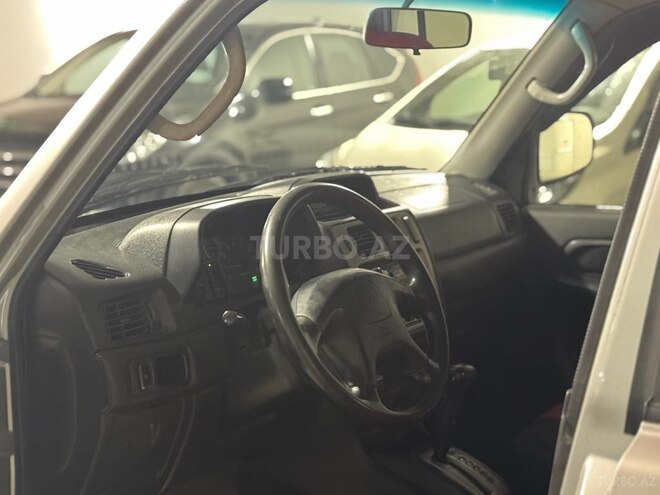 Mitsubishi Pajero io 1999, 233,000 km - 1.8 l - Bakı