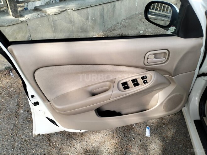Nissan Sunny 2006, 650,000 km - 1.3 l - Bakı
