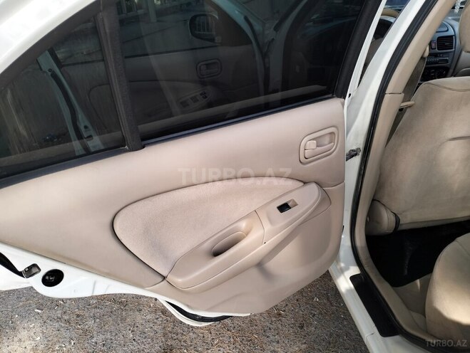 Nissan Sunny 2006, 650,000 km - 1.3 l - Bakı
