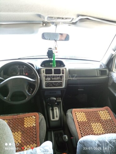 Mitsubishi Pajero io 1998, 300,000 km - 1.8 л - Beyləqan
