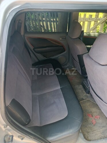 Mitsubishi Airtrek 2002, 302,000 km - 2.0 l - Saatlı