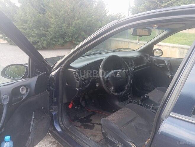 Opel Vectra 1998, 492,000 km - 1.8 l - Qusar