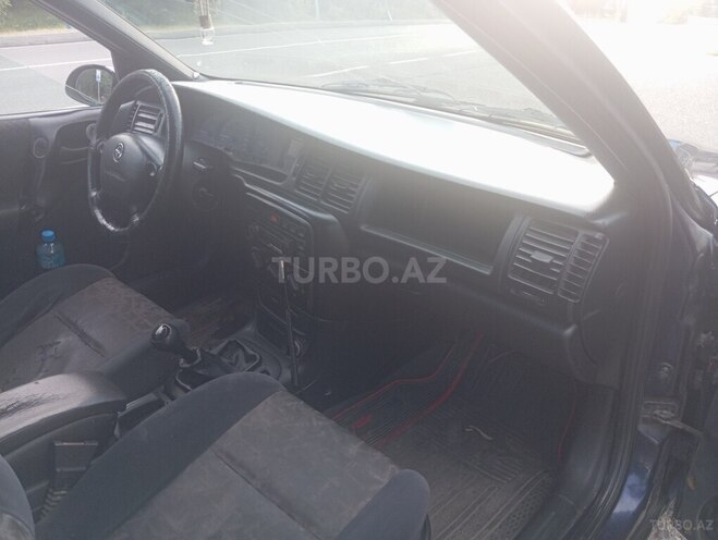 Opel Vectra 1998, 492,000 km - 1.8 l - Qusar