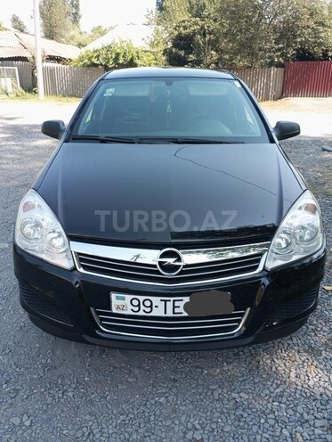 Opel Astra 2009, 223,000 km - 1.4 l - Qax