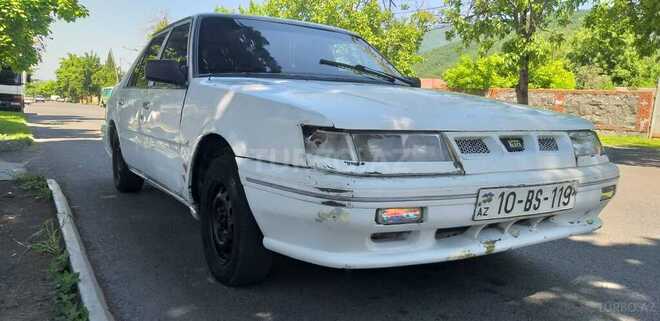 Kia  1994, 320,000 km - 1.5 l - Qax