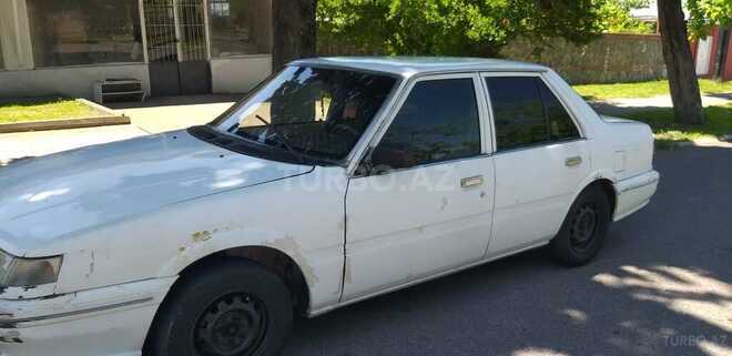 Kia  1994, 320,000 km - 1.5 l - Qax