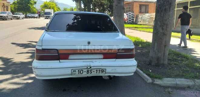 Kia  1994, 320,000 km - 1.5 l - Qax
