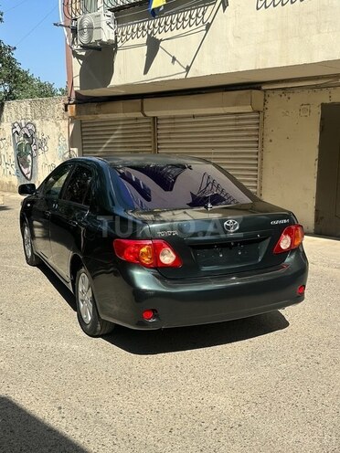 Toyota Corolla 2009, 310,000 km - 1.6 l - Bakı