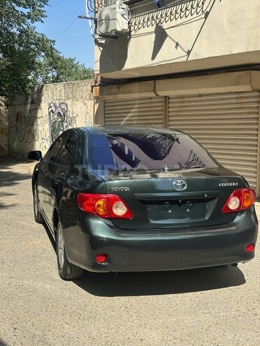 Toyota Corolla 2009, 310,000 km - 1.6 l - Bakı