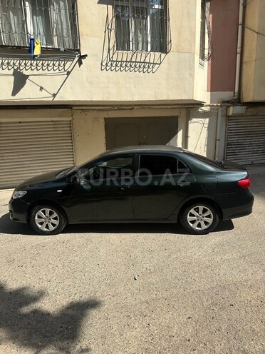 Toyota Corolla 2009, 310,000 km - 1.6 l - Bakı