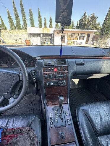 Mercedes E 230 1997, 300,324 km - 2.3 l - Bakı