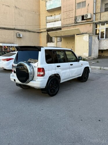 Mitsubishi Pajero io 1999, 395,847 km - 1.8 l - Bakı