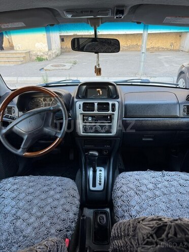 Mitsubishi Pajero io 1999, 395,847 km - 1.8 l - Bakı