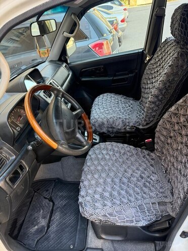 Mitsubishi Pajero io 1999, 395,847 km - 1.8 l - Bakı