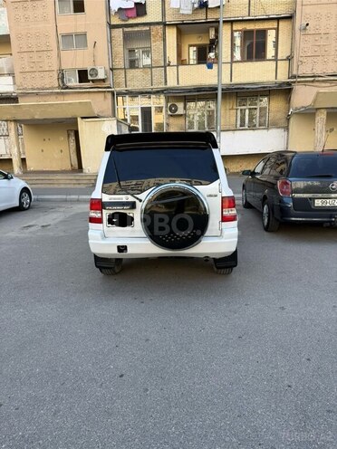 Mitsubishi Pajero io 1999, 395,847 km - 1.8 l - Bakı