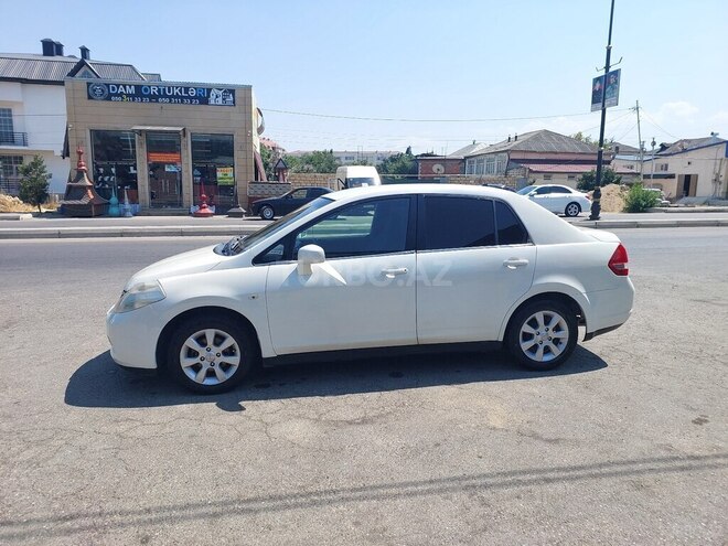 Nissan Tiida 2008, 360,000 km - 1.6 l - Quba