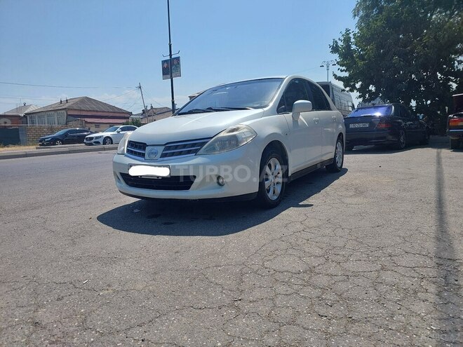 Nissan Tiida 2008, 360,000 km - 1.6 l - Quba