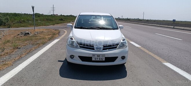 Nissan Tiida 2011, 198,000 km - 1.5 l - Ucar