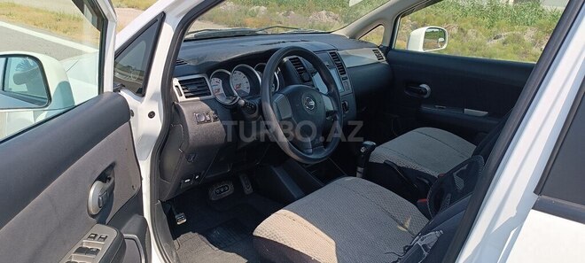 Nissan Tiida 2011, 198,000 km - 1.5 l - Ucar