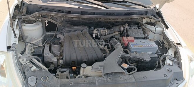 Nissan Tiida 2011, 198,000 km - 1.5 l - Ucar