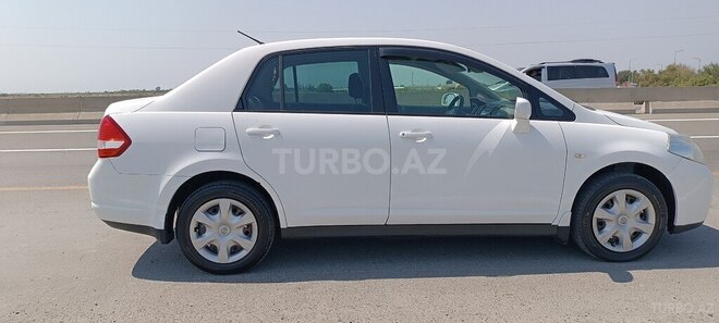 Nissan Tiida 2011, 198,000 km - 1.5 l - Ucar