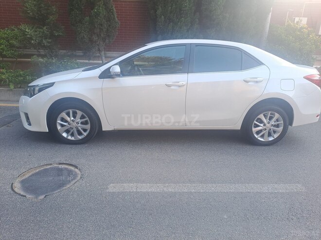 Toyota Corolla 2015, 173,000 km - 1.6 l - Bakı