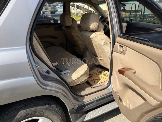 Kia Sportage 2009, 289,000 km - 2.0 l - Bakı