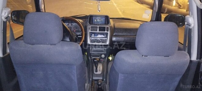 Mitsubishi Pajero io 2001, 318,000 km - 2.0 l - Bakı