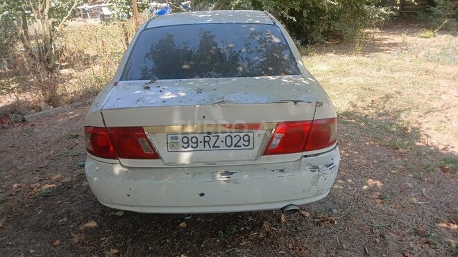 Kia Optima 2004, 256,984 km - 2.0 l - Masallı