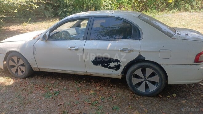 Kia Optima 2004, 256,984 km - 2.0 l - Masallı