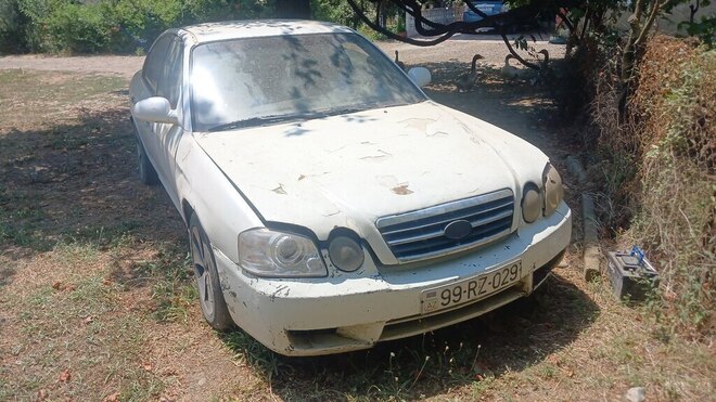 Kia Optima 2004, 256,984 km - 2.0 l - Masallı