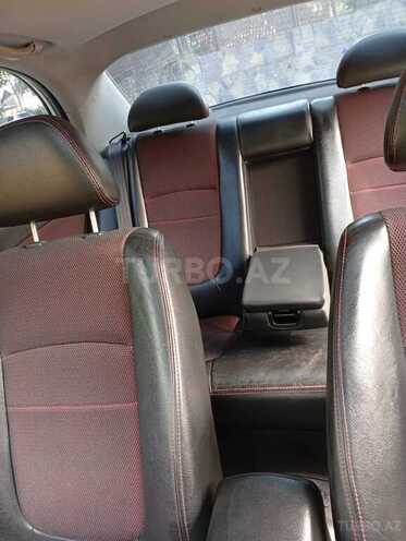 Kia Cerato 2008, 337,755 km - 2.0 l - Quba