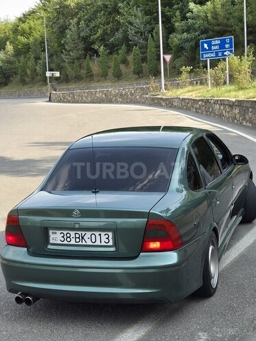 Opel Vectra 1999, 250,000 km - 1.8 l - Qusar
