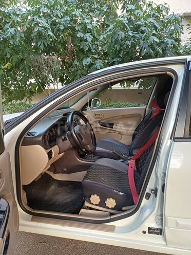 Nissan Sunny 2009, 229,550 km - 1.6 l - Bakı