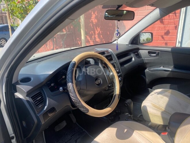 Kia Sportage 2009, 253,000 km - 2.0 l - Bakı
