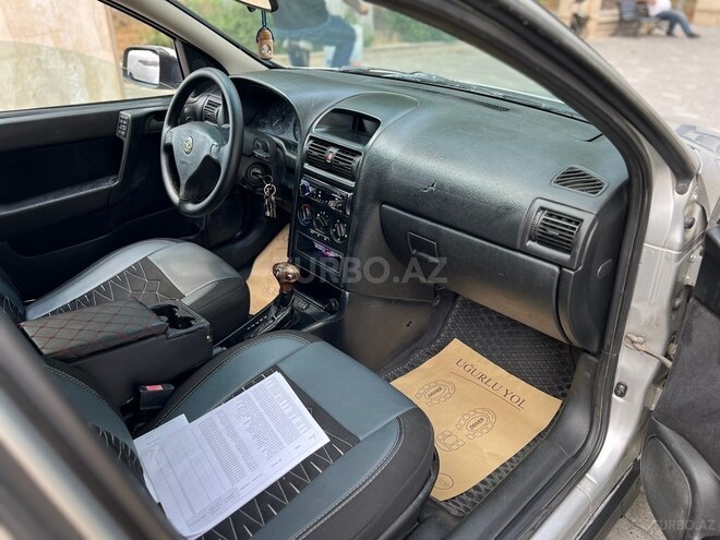 Opel Astra 1998, 324,685 km - 1.8 l - Quba