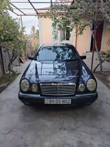 Mercedes E 220 1997, 215,486 km - 2.2 l - Bakı