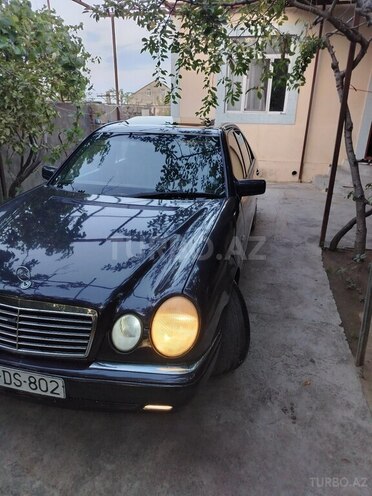 Mercedes E 220 1997, 215,486 km - 2.2 l - Bakı