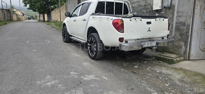 Mitsubishi L200 2009, 320,000 km - 2.5 л - Oğuz