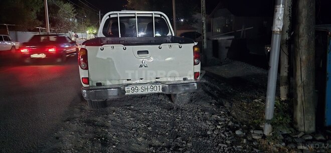 Mitsubishi L200 2009, 320,000 km - 2.5 л - Oğuz