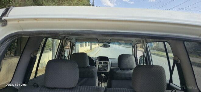 Mitsubishi Pajero io 1999, 239,100 km - 2.0 l - Bakı