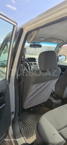 Mitsubishi Pajero io 1999, 239,100 km - 2.0 l - Bakı