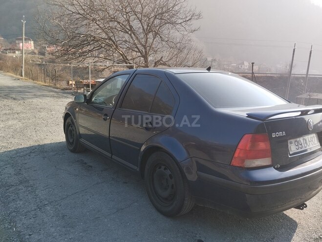 Volkswagen Bora 1999, 402,000 km - 1.6 l - Qax