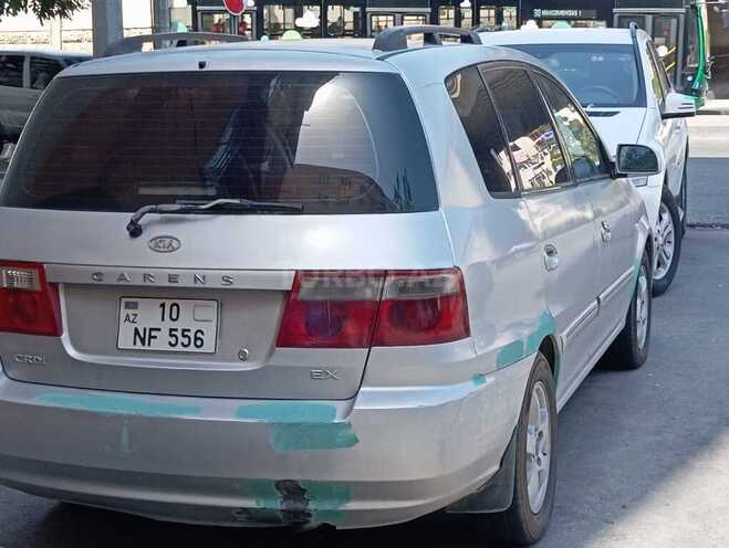 Kia Carens 2004, 200,000 km - 2.0 l - Bakı